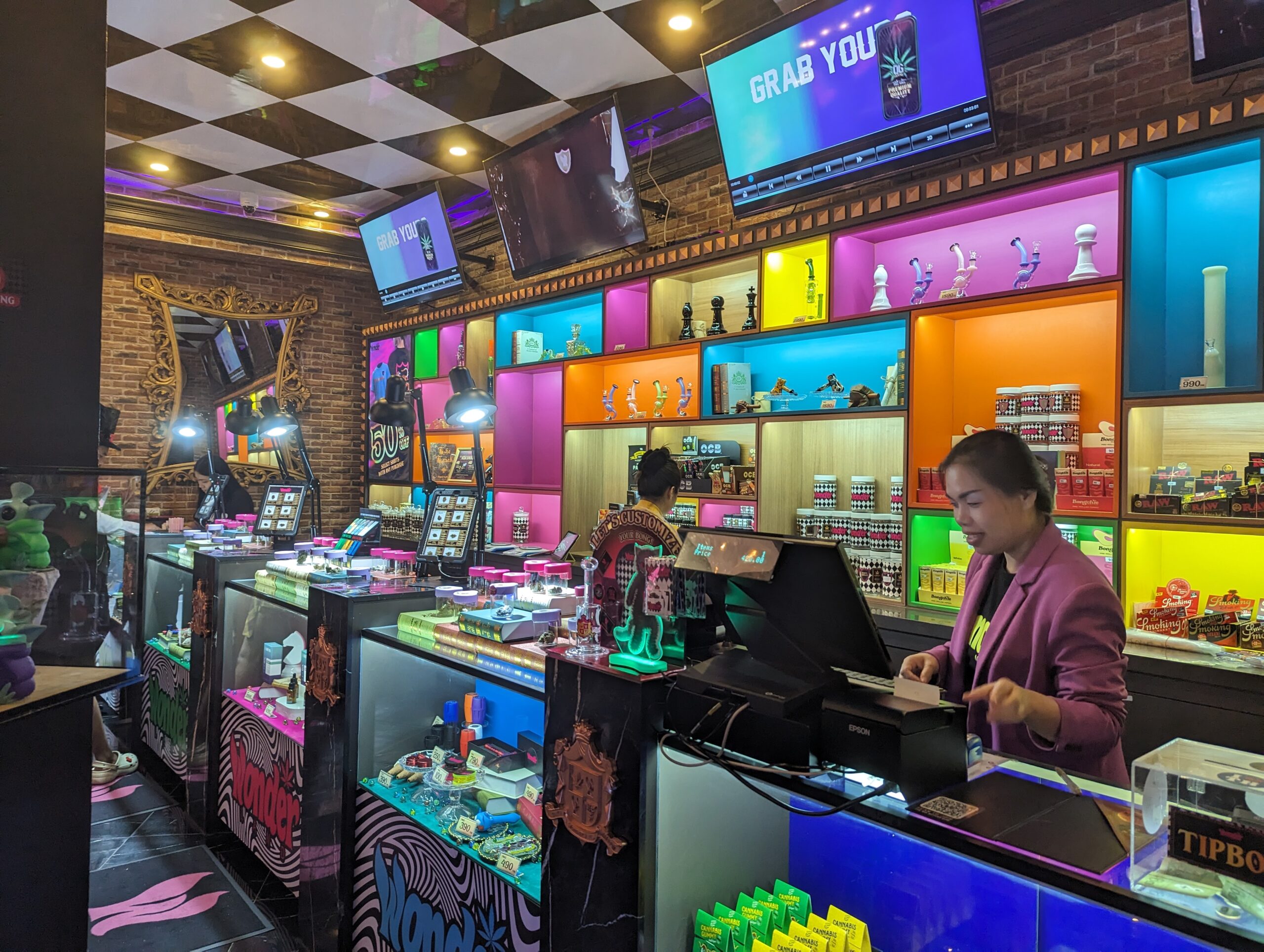 A cannabis shop with many bongs, gadgets, and fun knick-knacks to mirror Alice in Wonderland. Located in Bangkok.